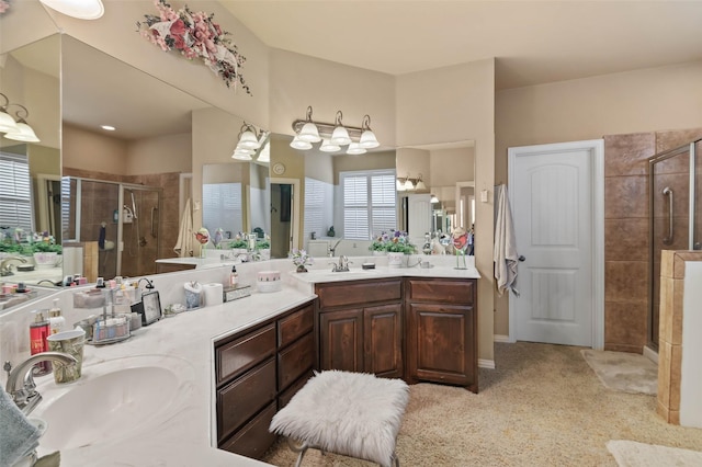 full bath featuring a stall shower and vanity