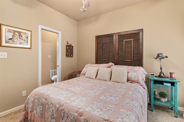 carpeted bedroom with baseboards