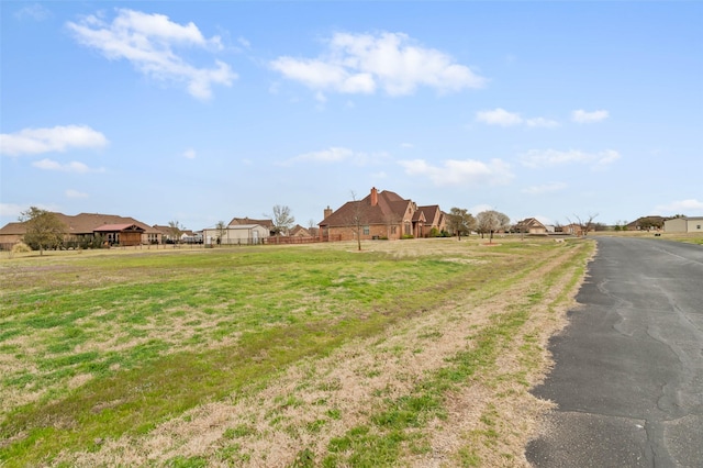 view of road featuring a residential view