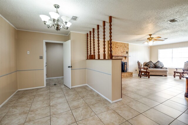 interior space featuring a chandelier, light tile patterned floors, and visible vents