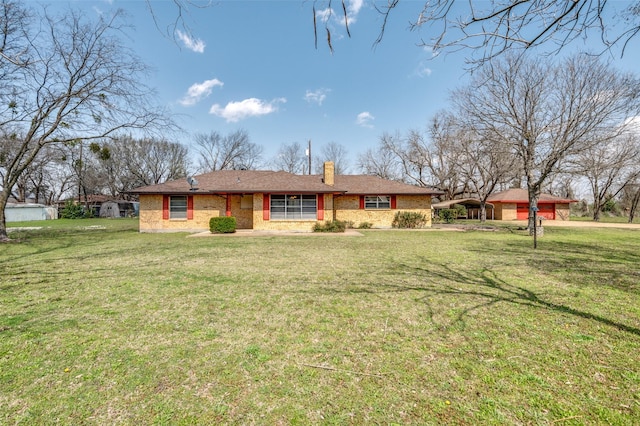 ranch-style home featuring a chimney and a front lawn