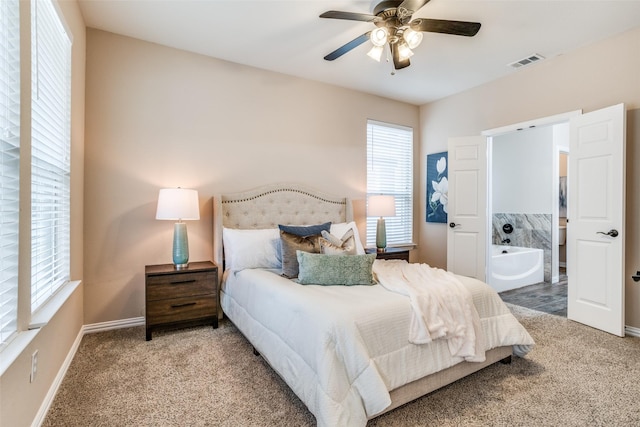 bedroom featuring carpet, multiple windows, and visible vents