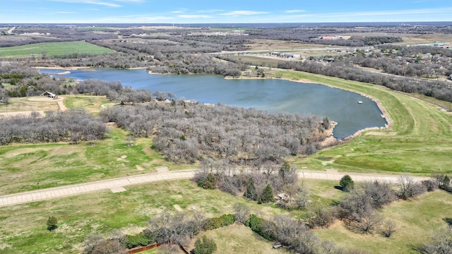 drone / aerial view with a water view and a rural view