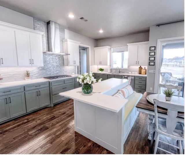 1000 Sutherland Cres, Northlake, TX 76247 - kitchen with wall chimney range hood, stainless steel appliances, gray cabinets, white cabinetry, and recessed lighting