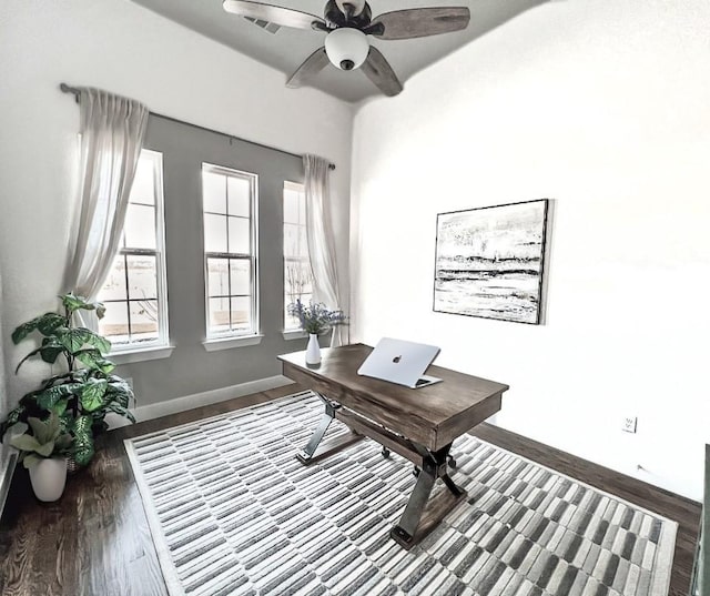 office area featuring wood finished floors, baseboards, and ceiling fan