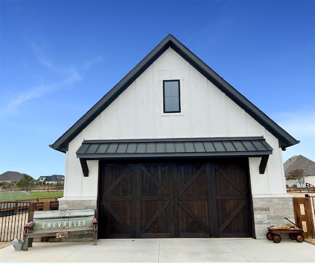 garage featuring fence