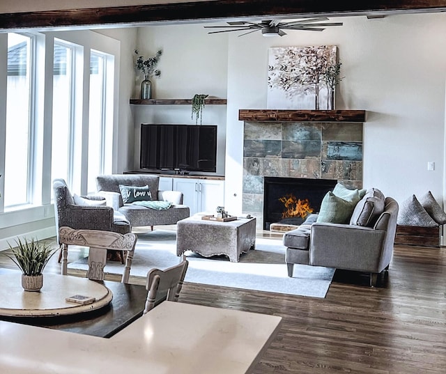 1000 Sutherland Cres, Northlake, TX 76247 - living room featuring plenty of natural light, wood finished floors, a tile fireplace, and a ceiling fan
