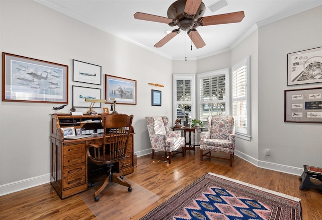 office area with ornamental molding, wood finished floors, and baseboards