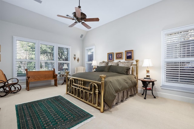 carpeted bedroom featuring ceiling fan, visible vents, baseboards, and vaulted ceiling