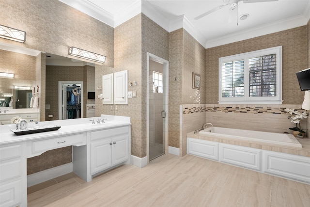 bathroom featuring crown molding, a stall shower, a healthy amount of sunlight, and a garden tub