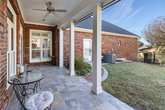 view of patio / terrace featuring ceiling fan, fence, and central AC unit