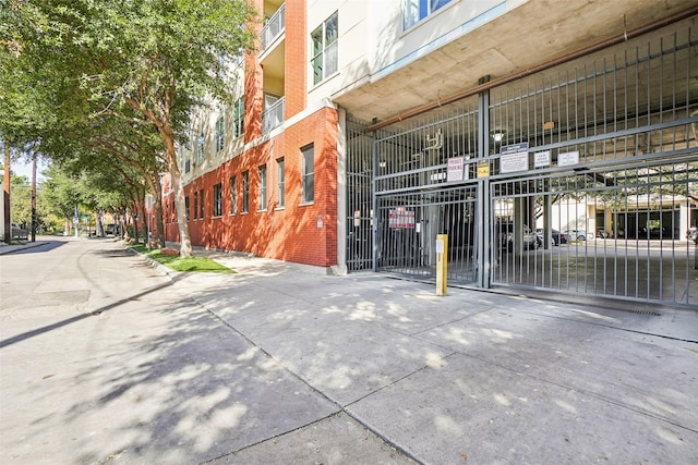 exterior space with curbs and sidewalks