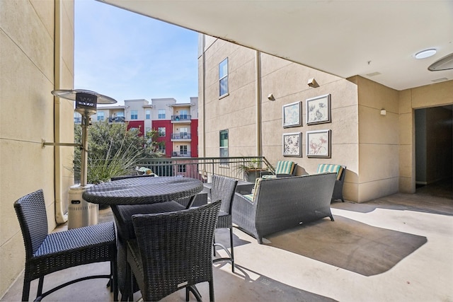 view of patio / terrace with a balcony