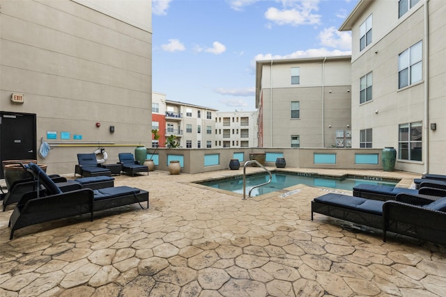 community pool featuring a patio