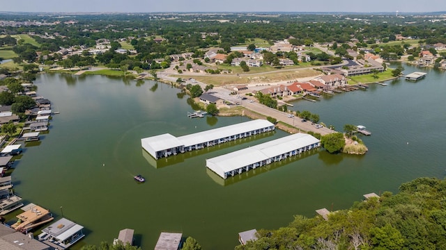 birds eye view of property with a residential view and a water view