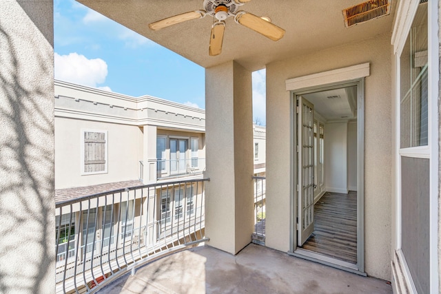 balcony featuring ceiling fan and visible vents