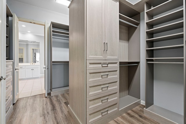 spacious closet with wood finished floors