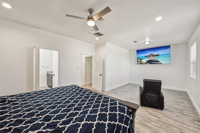 unfurnished bedroom with wood finished floors, visible vents, and recessed lighting