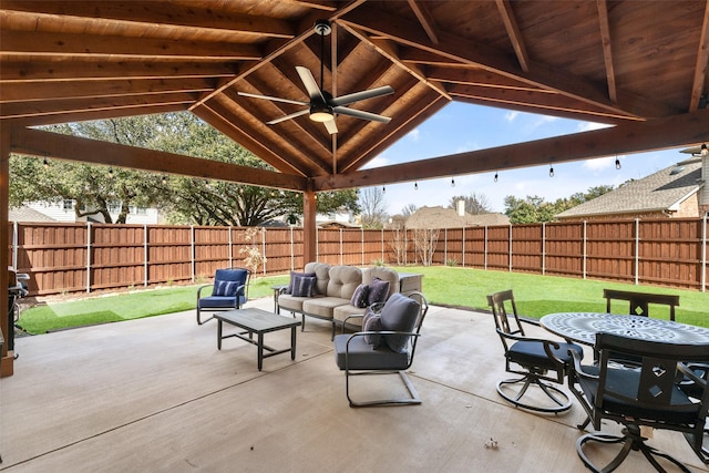 view of patio / terrace with a ceiling fan, a fenced backyard, a gazebo, and an outdoor hangout area