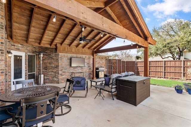 view of patio / terrace featuring ceiling fan, fence, and grilling area