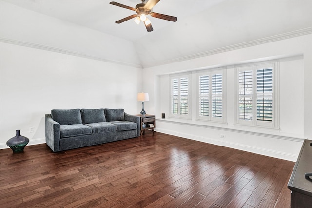 living room featuring ceiling fan, vaulted ceiling, dark wood finished floors, and a wealth of natural light