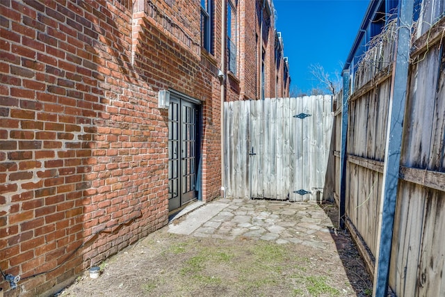 view of patio / terrace featuring fence