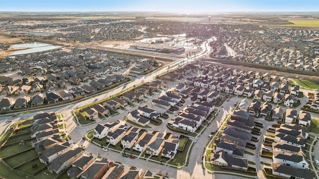 aerial view featuring a residential view and a water view