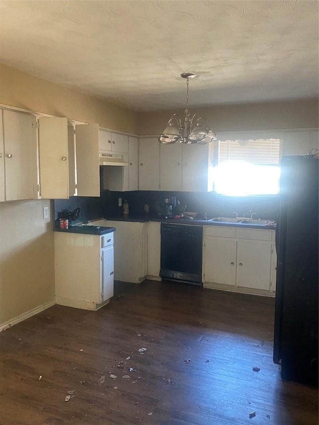 kitchen featuring dishwashing machine, under cabinet range hood, white cabinets, and a sink