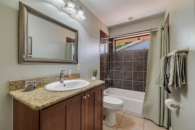 bathroom with shower / bath combination with curtain, vanity, toilet, and tile patterned floors