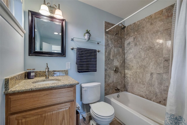 bathroom featuring shower / bath combo, vanity, and toilet