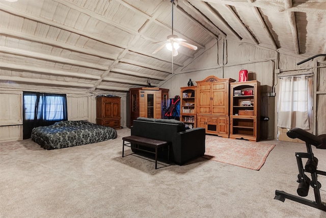 carpeted bedroom with lofted ceiling and multiple windows