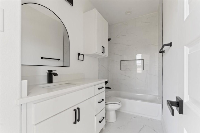 full bathroom featuring toilet, marble finish floor, shower / bathtub combination, and vanity