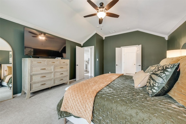 bedroom with lofted ceiling, carpet, ornamental molding, and a ceiling fan