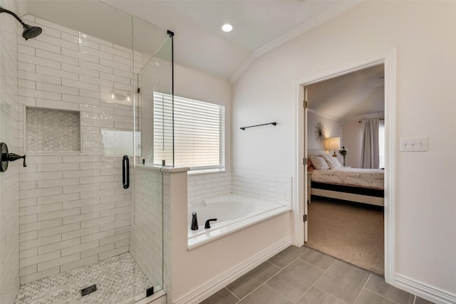 ensuite bathroom with a garden tub, a shower stall, tile patterned floors, ensuite bath, and crown molding