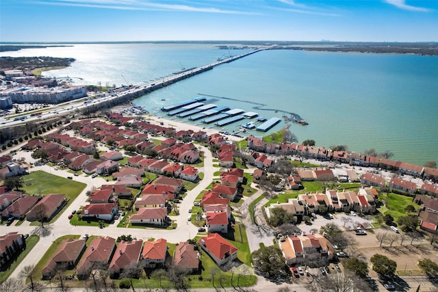 birds eye view of property featuring a residential view and a water view