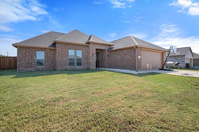 view of front of property featuring brick siding, roof with shingles, concrete driveway, a front yard, and a garage