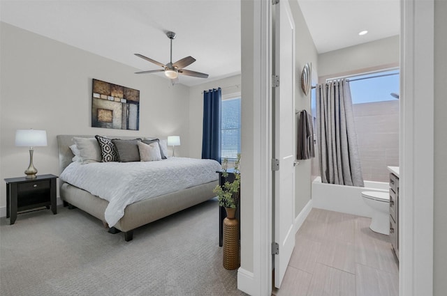 bedroom with baseboards and ceiling fan