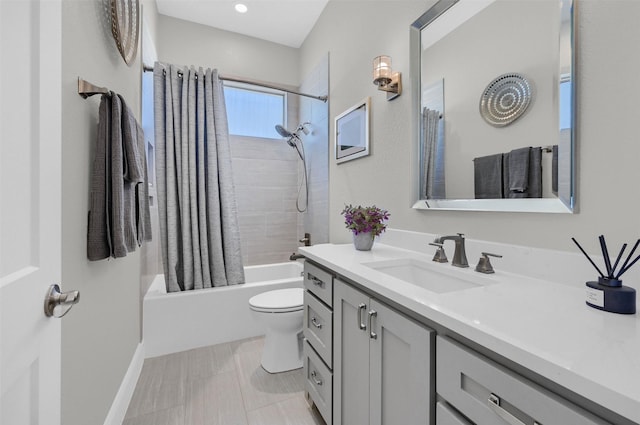 full bathroom featuring toilet, shower / bath combo, vanity, and tile patterned flooring