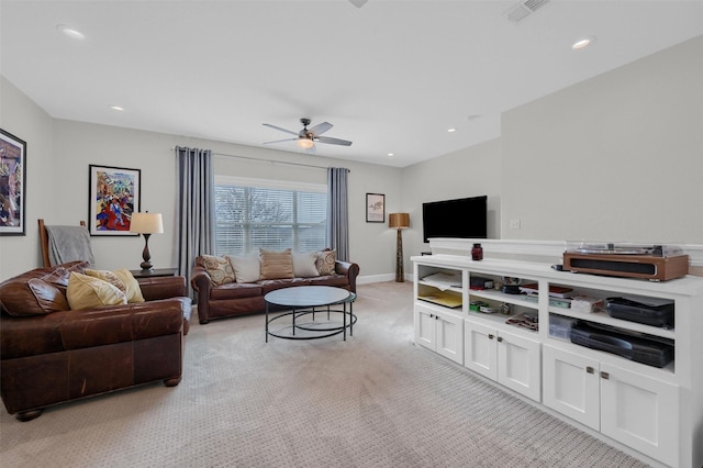 living room with visible vents, light carpet, a ceiling fan, recessed lighting, and baseboards