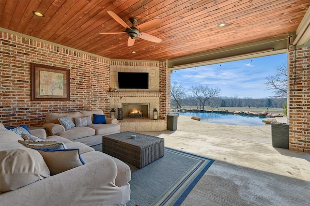 view of patio featuring an outdoor pool, ceiling fan, and an outdoor living space with a fireplace