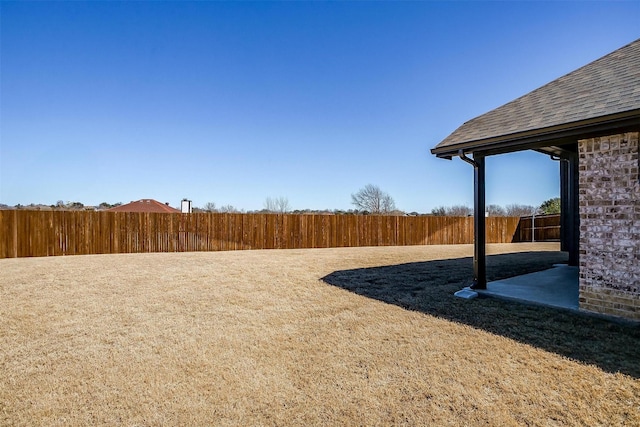 view of yard featuring fence