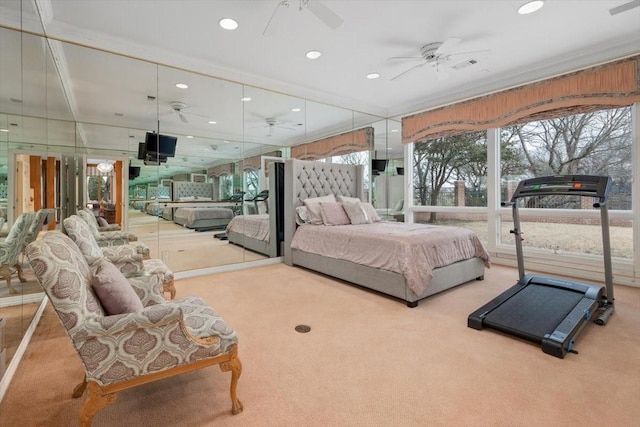 bedroom with carpet floors, recessed lighting, visible vents, and ornamental molding