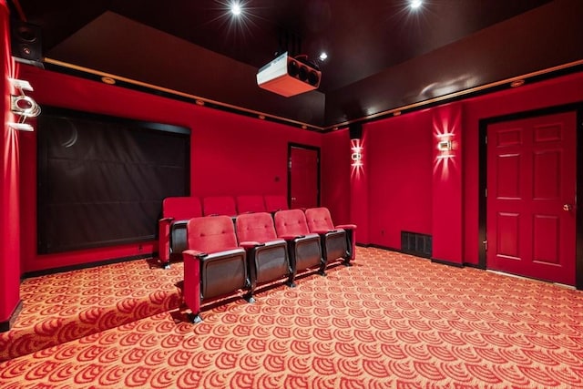 cinema room with carpet and visible vents