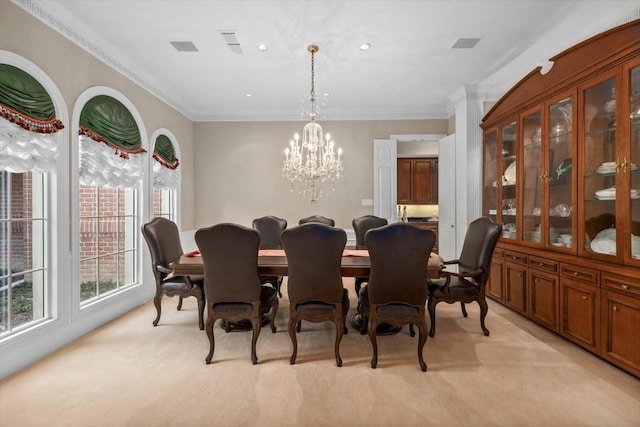 dining space featuring light carpet, ornamental molding, visible vents, and a notable chandelier