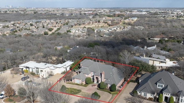 birds eye view of property with a residential view