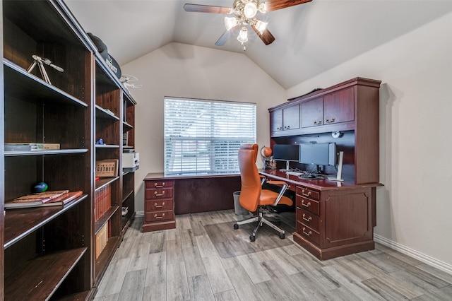 office space featuring lofted ceiling, light wood-style flooring, baseboards, and ceiling fan