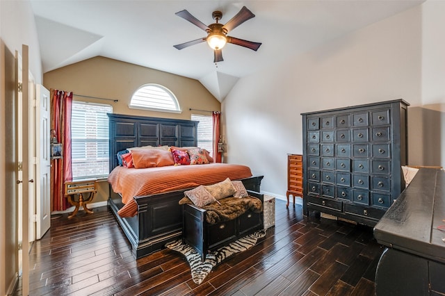 bedroom featuring baseboards, a ceiling fan, lofted ceiling, and dark wood-style floors