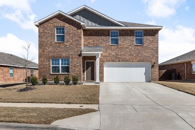 view of front of house featuring brick siding, board and batten siding, central AC, driveway, and an attached garage