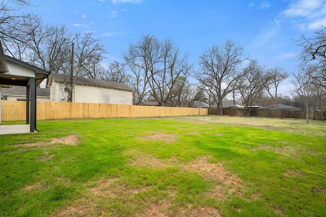 view of yard featuring a fenced backyard