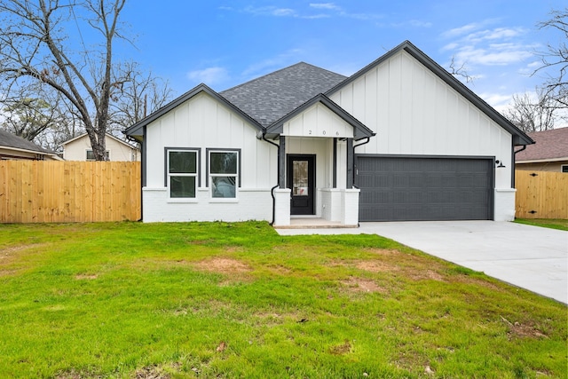 modern farmhouse style home featuring concrete driveway, roof with shingles, an attached garage, fence, and board and batten siding